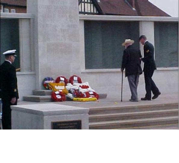Sunday, May 16, 2004:   Telegraphist Air Gunners Association Memorial Service at the Fleet Air Arm Memorial on the seafront (Lee-on-the-Solent). The cast of crew of Wartime Heritage, “Time To Remember” (British Tour) laid a wreath, a tribute in gold ribbon with the words “from the people of Canada”, with maple leaves and poppies.